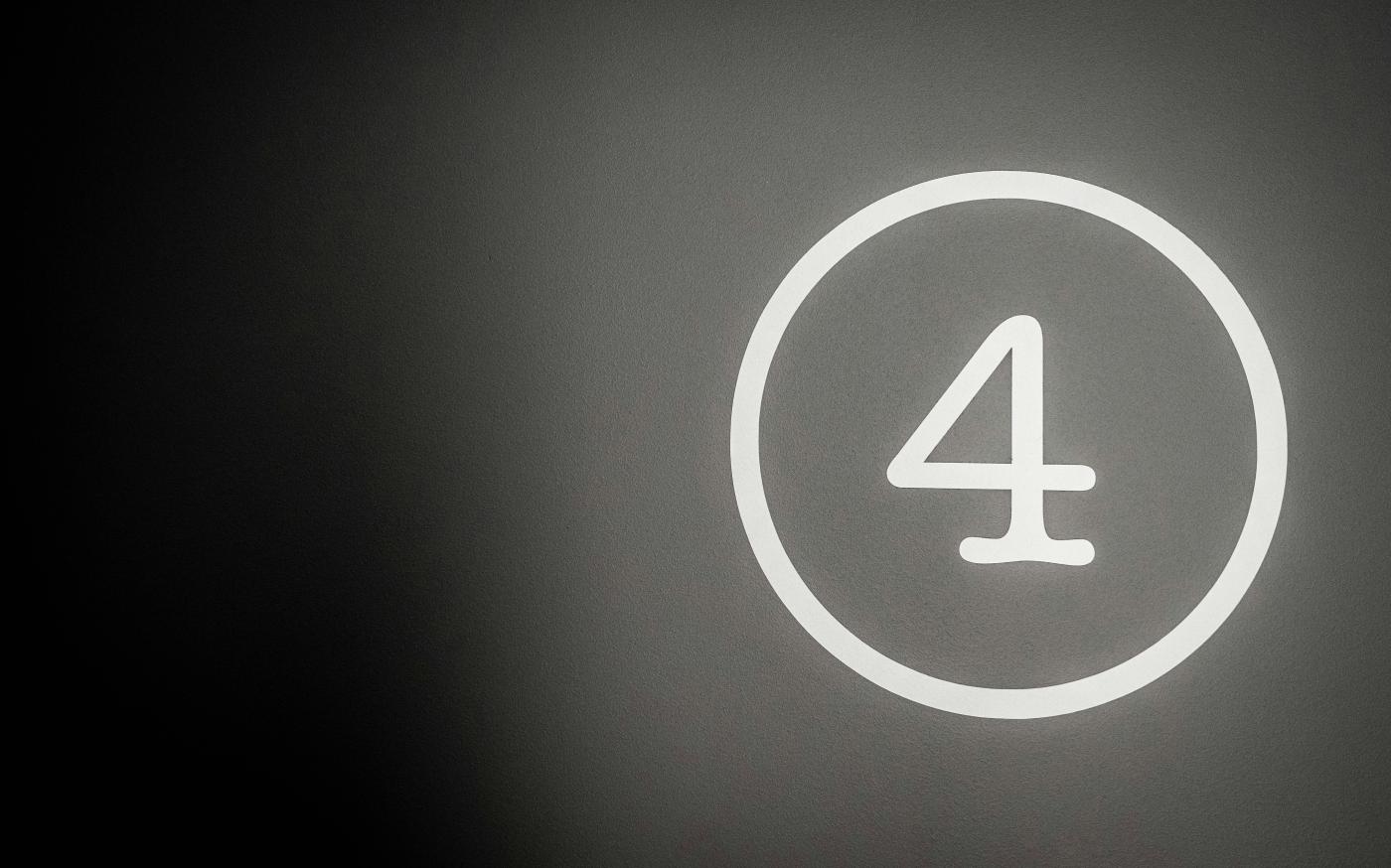 black and whites logo by Tim Hüfner courtesy of Unsplash.